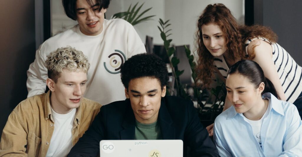 Multiracial team collaborating on a project in a modern office setting.